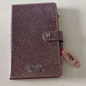 Victoria secret journal with pen.
